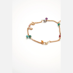 Armbnd med perler og vedhng